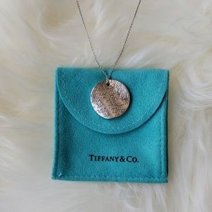 Tiffany & Co. Notes Fifth Ave Address Wavy Pendant